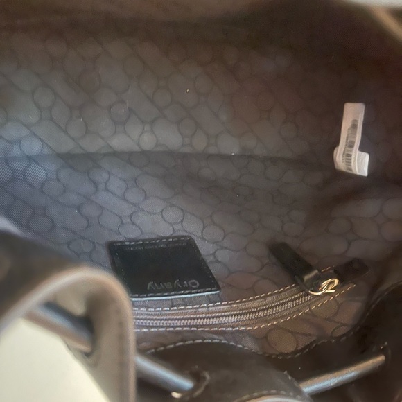 Black leather drawstring Oryany drawstring bucket bag. - Picture 8 of 15